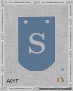 A taped needlepoint canvas with the design: Banner 18 mesh count Curved S White on Blue.