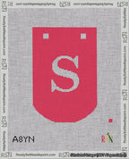 A taped needlepoint canvas with the design: Banner 18 mesh count Curved S White on Red.