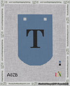 A taped needlepoint canvas with the design: Banner 18 mesh count Curved T Black on Blue.