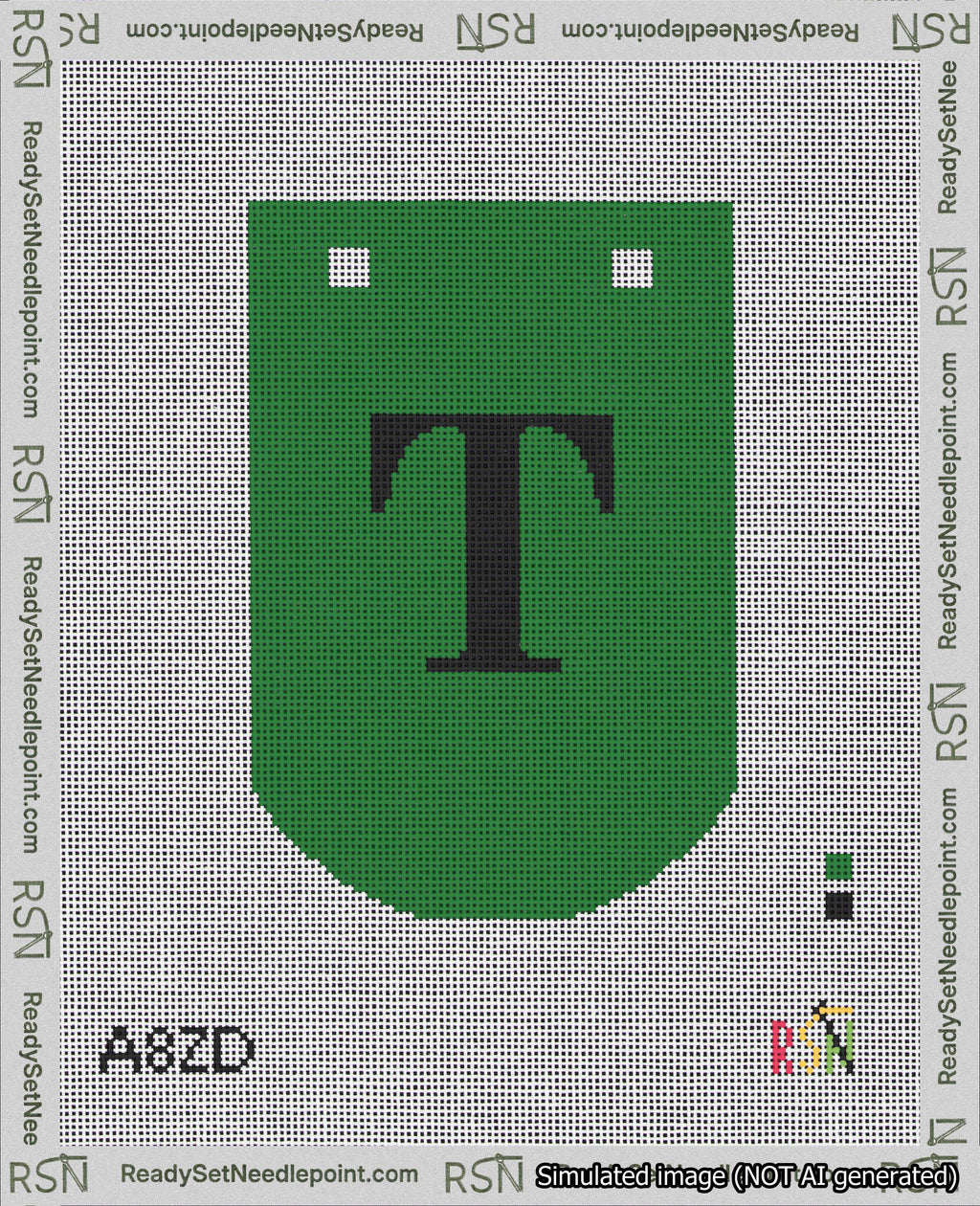 A taped needlepoint canvas with the design: Banner 18 mesh count Curved T Black on Green.