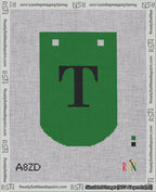 A taped needlepoint canvas with the design: Banner 18 mesh count Curved T Black on Green.