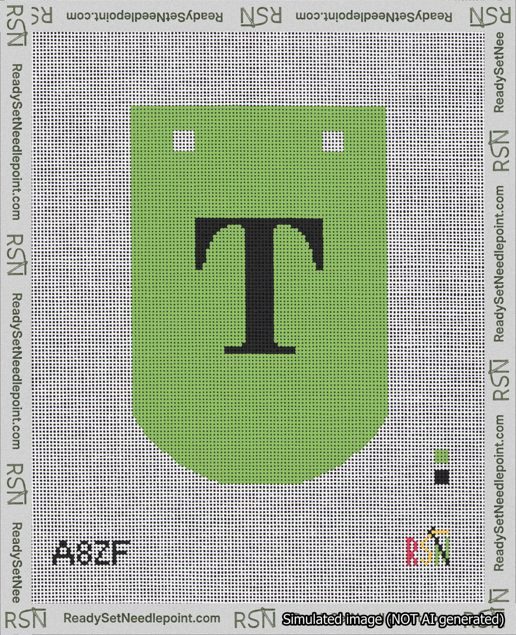 A taped needlepoint canvas with the design: Banner 18 mesh count Curved T Black on Light Green.