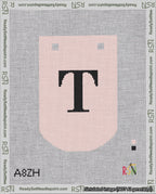 A taped needlepoint canvas with the design: Banner 18 mesh count Curved T Black on Pink.