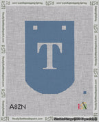 A taped needlepoint canvas with the design: Banner 18 mesh count Curved T White on Blue.