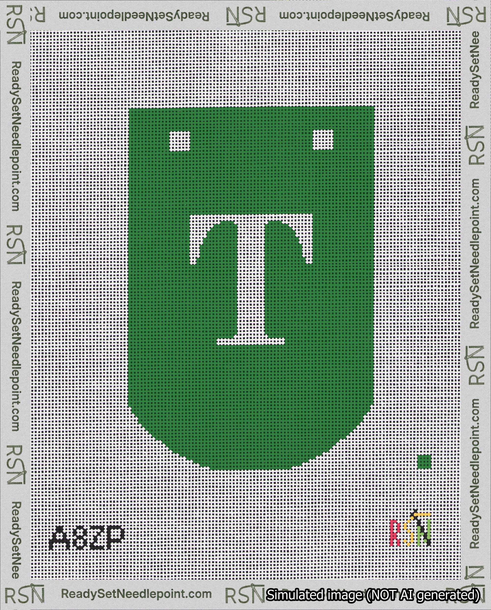 A taped needlepoint canvas with the design: Banner 18 mesh count Curved T White on Green.