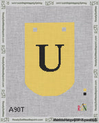 A taped needlepoint canvas with the design: Banner 18 mesh count Curved U Black on Yellow.