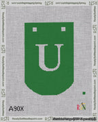 A taped needlepoint canvas with the design: Banner 18 mesh count Curved U White on Green.
