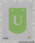 A taped needlepoint canvas with the design: Banner 18 mesh count Curved U White on Light Green.