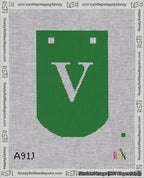A taped needlepoint canvas with the design: Banner 18 mesh count Curved V White on Green.