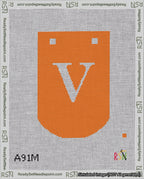 A taped needlepoint canvas with the design: Banner 18 mesh count Curved V White on Orange.