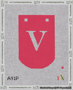 A taped needlepoint canvas with the design: Banner 18 mesh count Curved V White on Red.