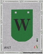 A taped needlepoint canvas with the design: Banner 18 mesh count Curved W Black on Green.