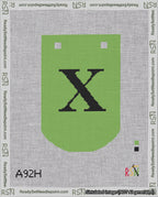 A taped needlepoint canvas with the design: Banner 18 mesh count Curved X Black on Light Green.