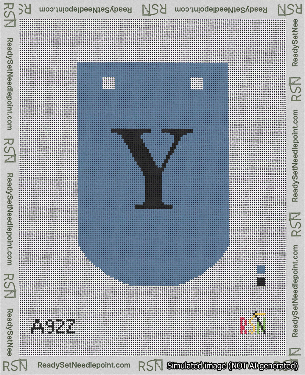 A taped needlepoint canvas with the design: Banner 18 mesh count Curved Y Black on Blue.