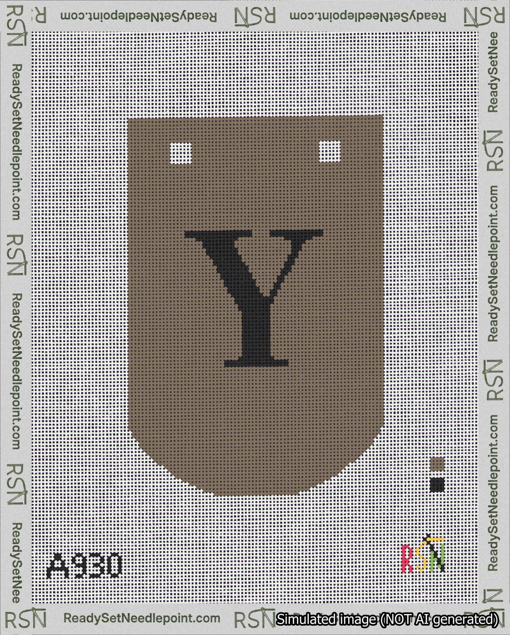 A taped needlepoint canvas with the design: Banner 18 mesh count Curved Y Black on Brown.