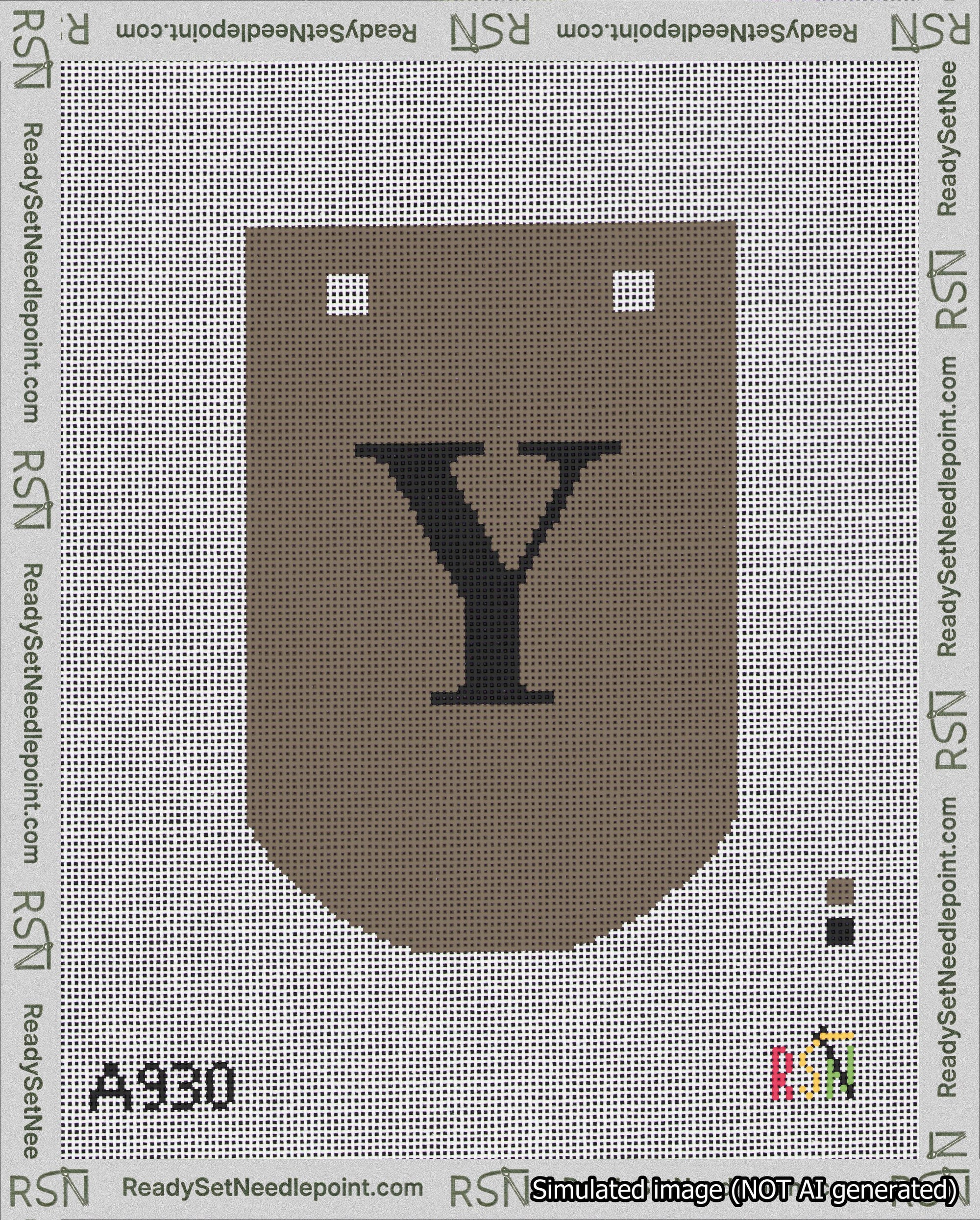 A taped needlepoint canvas with the design: Banner 18 mesh count Curved Y Black on Brown.