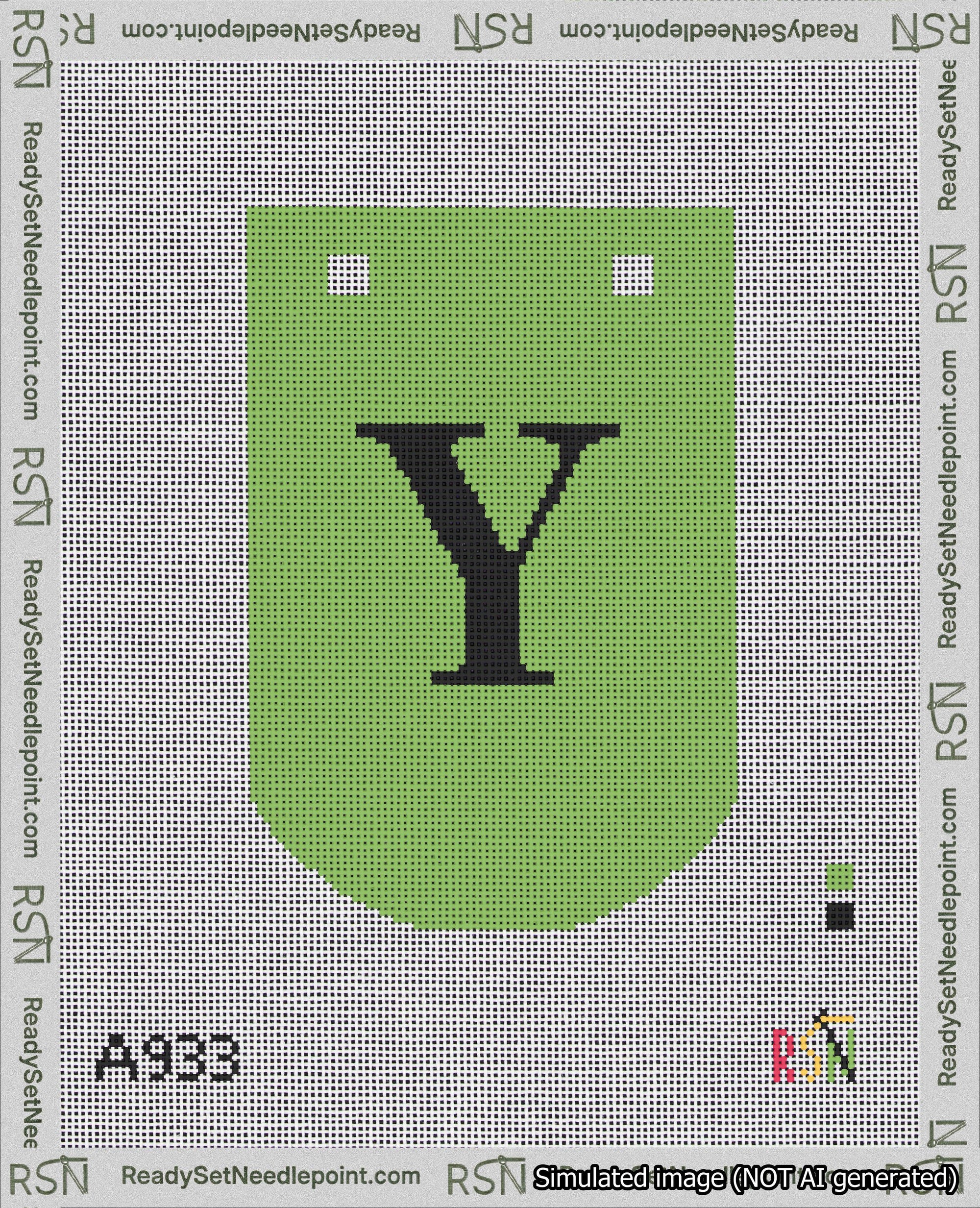 A taped needlepoint canvas with the design: Banner 18 mesh count Curved Y Black on Light Green.