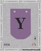 A taped needlepoint canvas with the design: Banner 18 mesh count Curved Y Black on Purple.