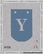 A taped needlepoint canvas with the design: Banner 18 mesh count Curved Y White on Blue.