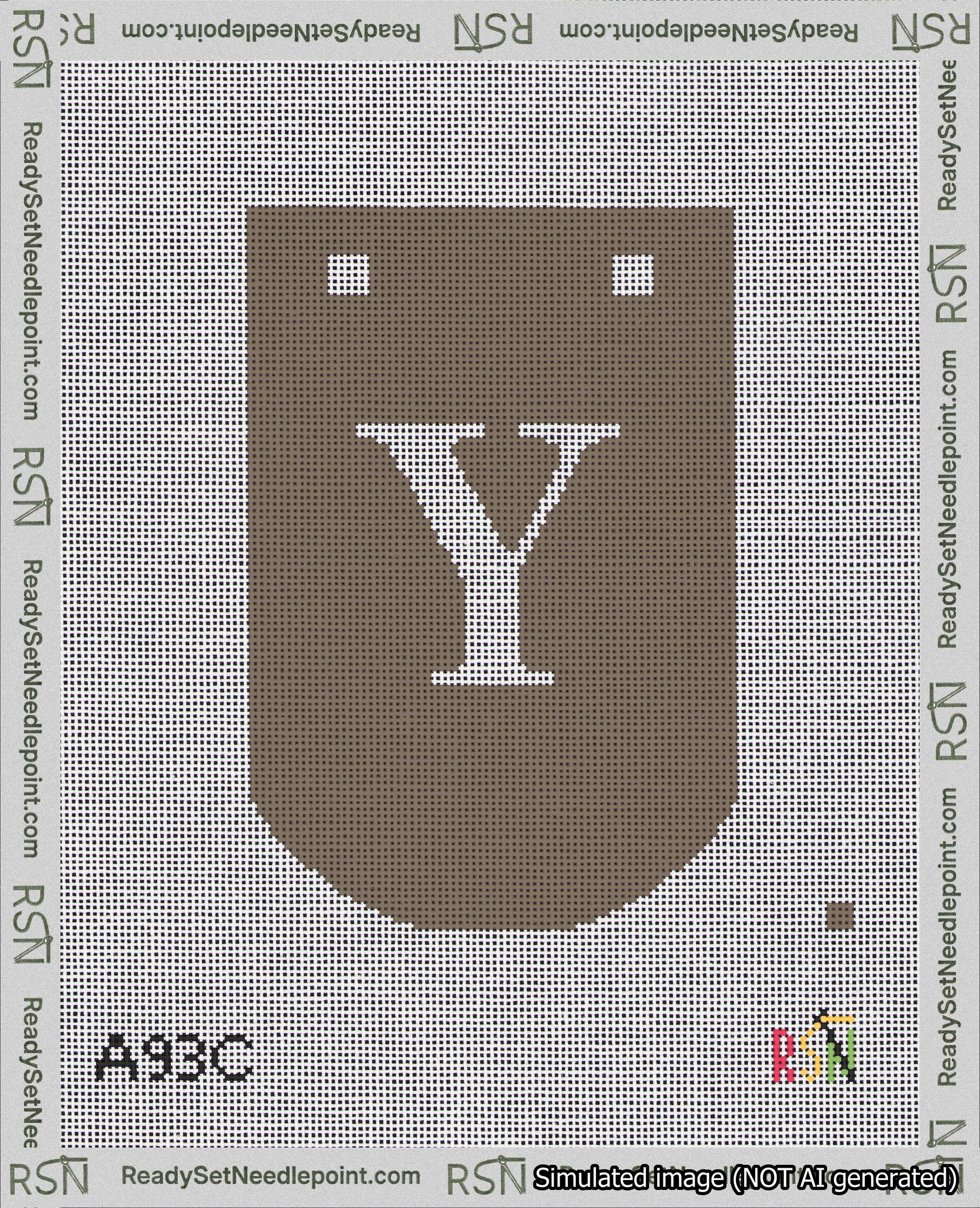 A taped needlepoint canvas with the design: Banner 18 mesh count Curved Y White on Brown.