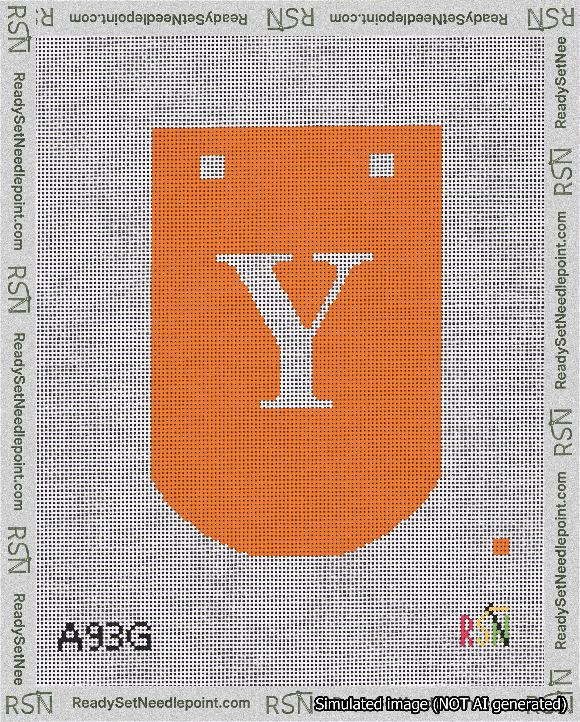 A taped needlepoint canvas with the design: Banner 18 mesh count Curved Y White on Orange.