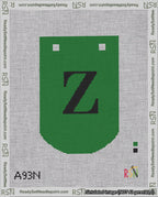 A taped needlepoint canvas with the design: Banner 18 mesh count Curved Z Black on Green.