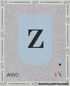 A taped needlepoint canvas with the design: Banner 18 mesh count Curved Z Black on Light Blue.