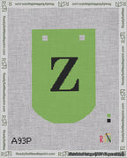 A taped needlepoint canvas with the design: Banner 18 mesh count Curved Z Black on Light Green.