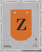 A taped needlepoint canvas with the design: Banner 18 mesh count Curved Z Black on Orange.