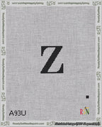 A taped needlepoint canvas with the design: Banner 18 mesh count Curved Z Black on White.