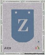 A taped needlepoint canvas with the design: Banner 18 mesh count Curved Z White on Blue.
