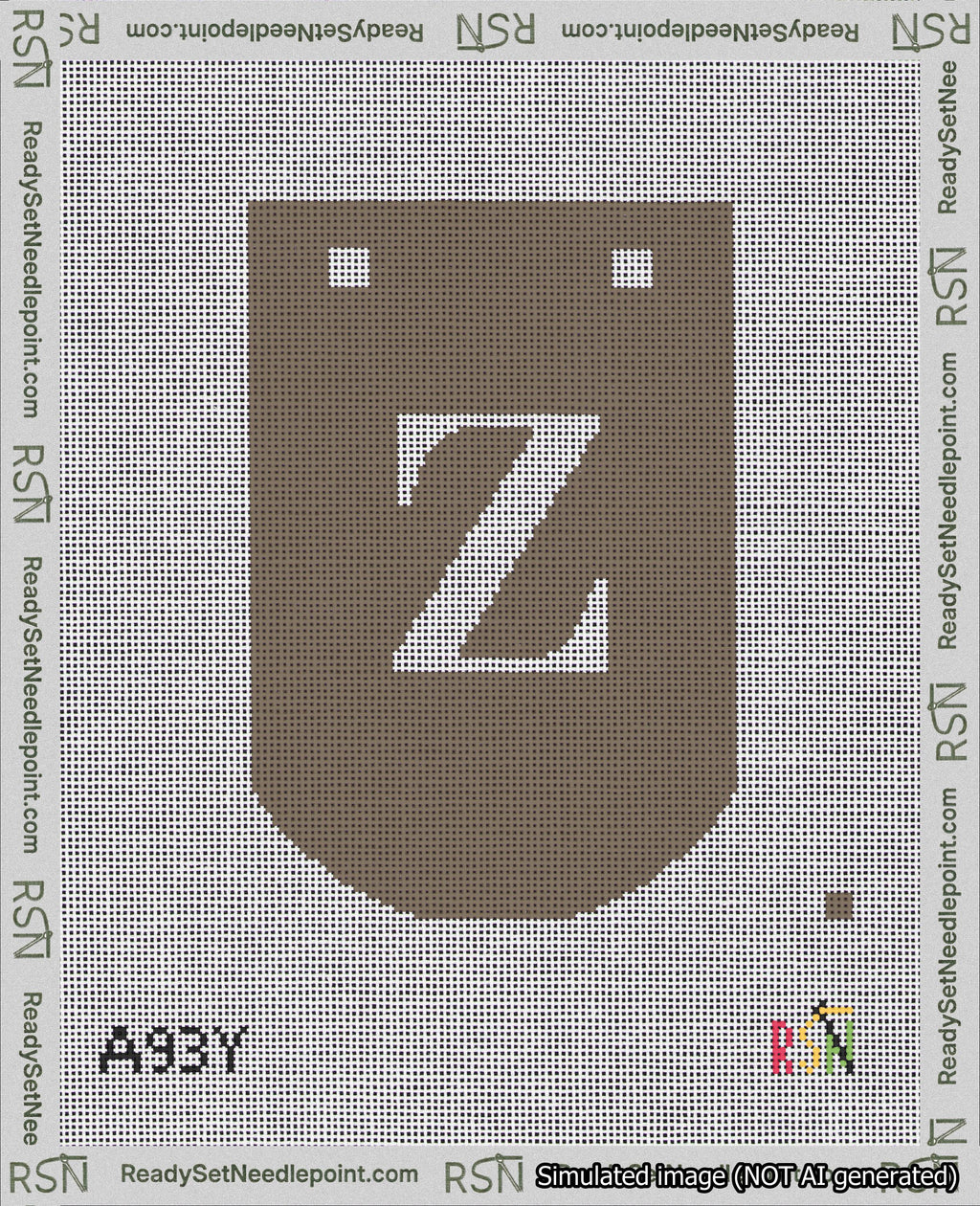 A taped needlepoint canvas with the design: Banner 18 mesh count Curved Z White on Brown.