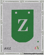 A taped needlepoint canvas with the design: Banner 18 mesh count Curved Z White on Green.