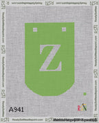 A taped needlepoint canvas with the design: Banner 18 mesh count Curved Z White on Light Green.