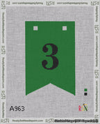 A taped needlepoint canvas with the design: Banner 18 mesh count Forked 3 Black on Green.