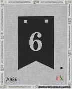 A taped needlepoint canvas with the design: Banner 18 mesh count Forked 6 White on Black.