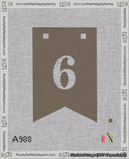 A taped needlepoint canvas with the design: Banner 18 mesh count Forked 6 White on Brown.
