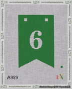 A taped needlepoint canvas with the design: Banner 18 mesh count Forked 6 White on Green.