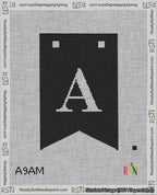 A taped needlepoint canvas with the design: Banner 18 mesh count Forked A White on Black.