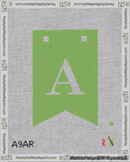 A taped needlepoint canvas with the design: Banner 18 mesh count Forked A White on Light Green.