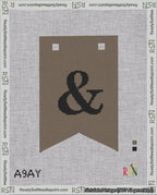 A taped needlepoint canvas with the design: Banner 18 mesh count Forked Ampersand Black on Brown.