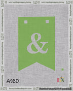 A taped needlepoint canvas with the design: Banner 18 mesh count Forked Ampersand White on Light Green.