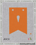 A taped needlepoint canvas with the design: Banner 18 mesh count Forked Apostrophe White on Orange.