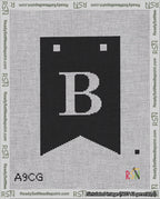 A taped needlepoint canvas with the design: Banner 18 mesh count Forked B White on Black.