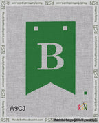 A taped needlepoint canvas with the design: Banner 18 mesh count Forked B White on Green.