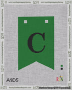 A taped needlepoint canvas with the design: Banner 18 mesh count Forked C Black on Green.