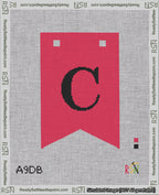 A taped needlepoint canvas with the design: Banner 18 mesh count Forked C Black on Red.
