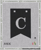 A taped needlepoint canvas with the design: Banner 18 mesh count Forked C White on Black.