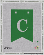 A taped needlepoint canvas with the design: Banner 18 mesh count Forked C White on Green.