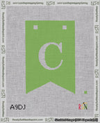 A taped needlepoint canvas with the design: Banner 18 mesh count Forked C White on Light Green.